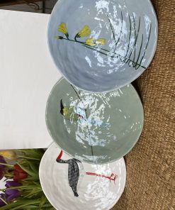 Gemma Orkin is a South African Ceramicist from Cape Town hand painting indigenous birds, plants and flowers onto plates and platters.