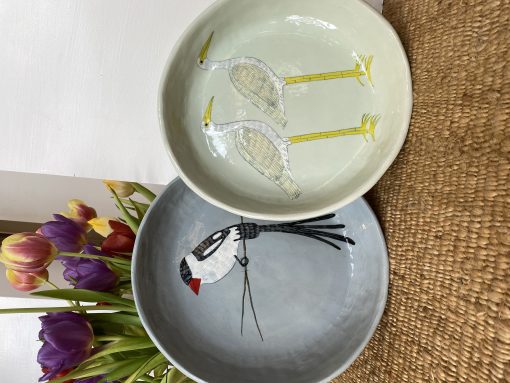 Gemma Orkin is a South African Ceramicist from Cape Town hand painting indigenous birds, plants and flowers onto plates and platters.
